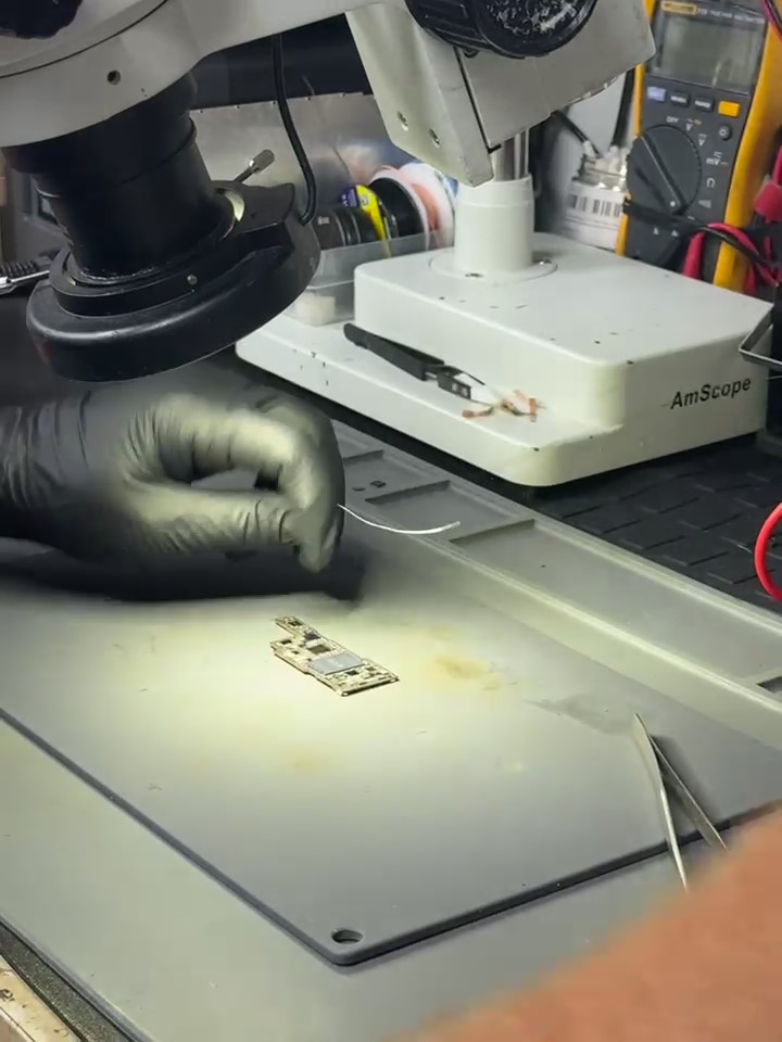 Technician working on device